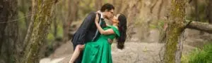 a man holding a woman in green dress compatibility tests